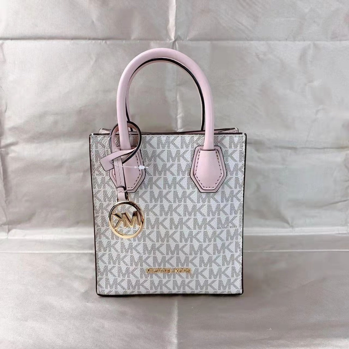 Michael Kors Mercer Extra-Small Logo and Leather Crossbody Bag In Powder Blush Multi Michael Kors Mercer Extra-Small Logo and Leather Crossbody Bag In Powder Blush Multi